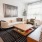 Living Room with sofa, accent chair, and large coffee table. 